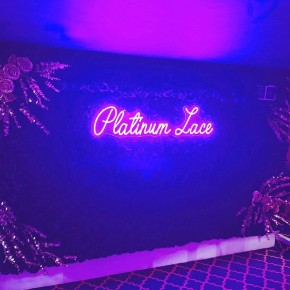 Bespoke flower and neon installation for Platinum Lace, Leicester Square, London, New Years Eve 2025
